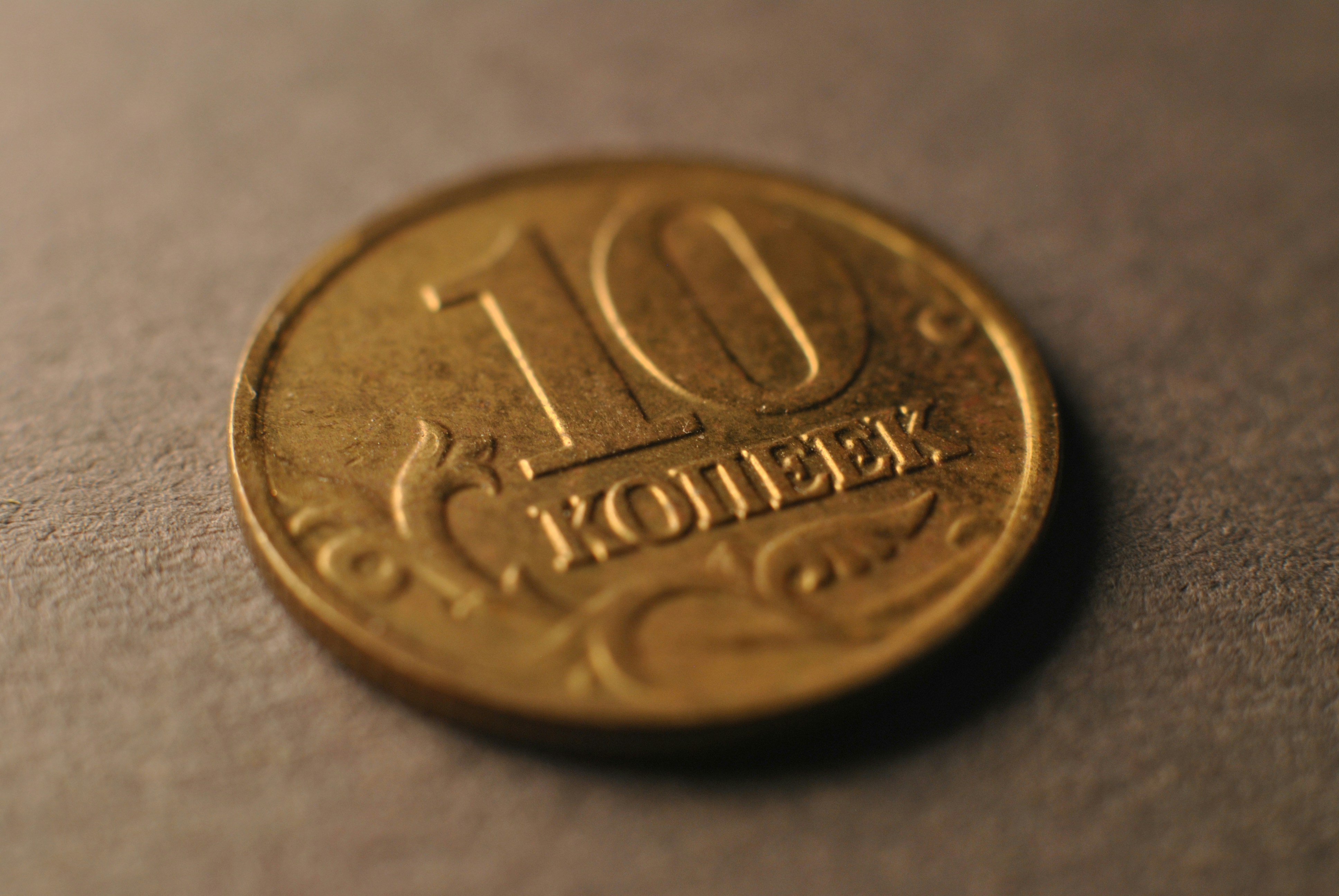 Haciendo la penalización de longitud correcta - Incitando más inteligencia por token a través del aprendizaje reforzado